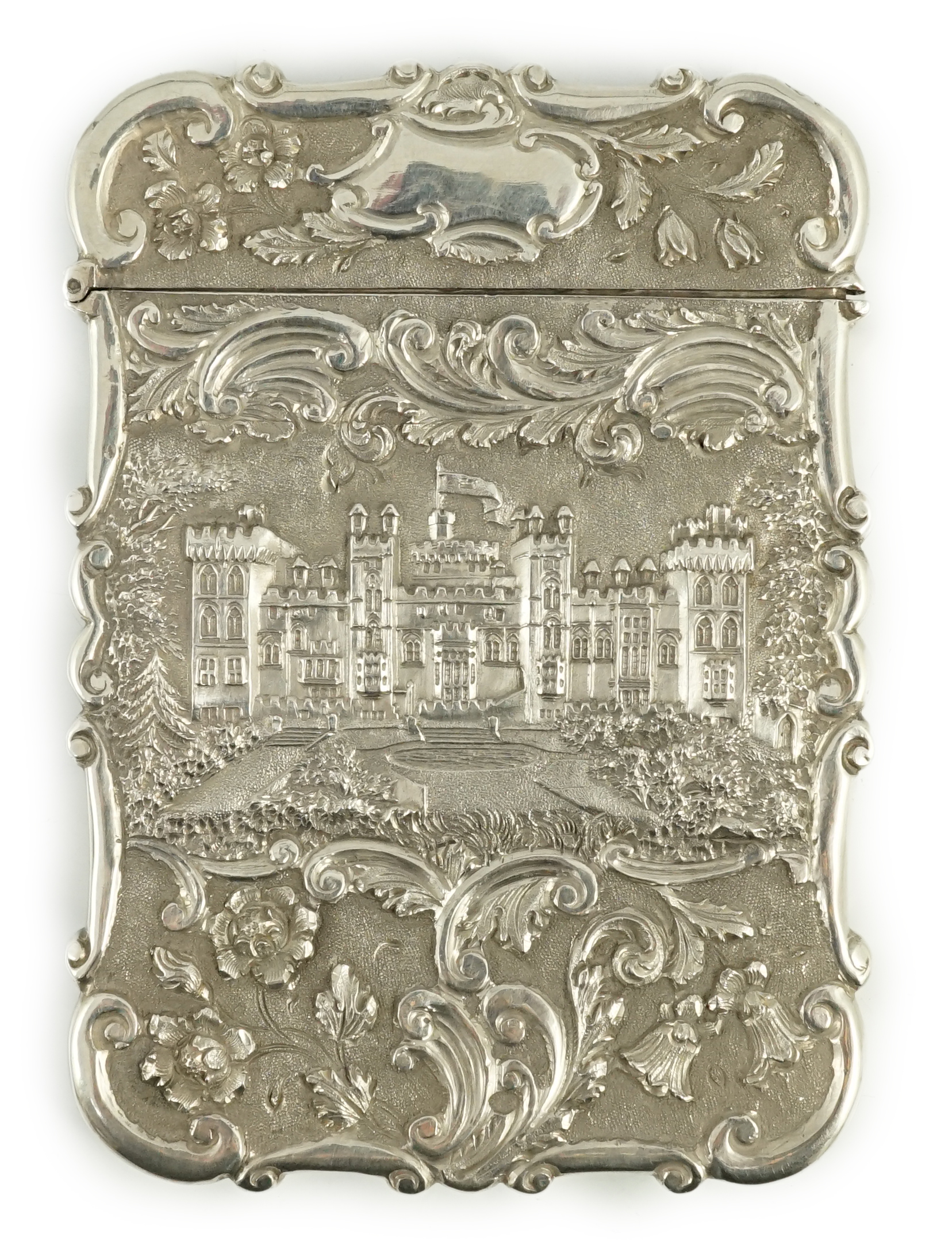 An early Victorian silver 'castle top' card case by Nathaniel Mills, depicting Windsor and Warwick castles, in fitted case
